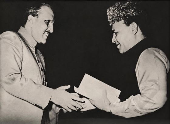 Dr. Zahoor Ahmad Azhar receiving the National Best Book Award from President Zia-ul-Haq